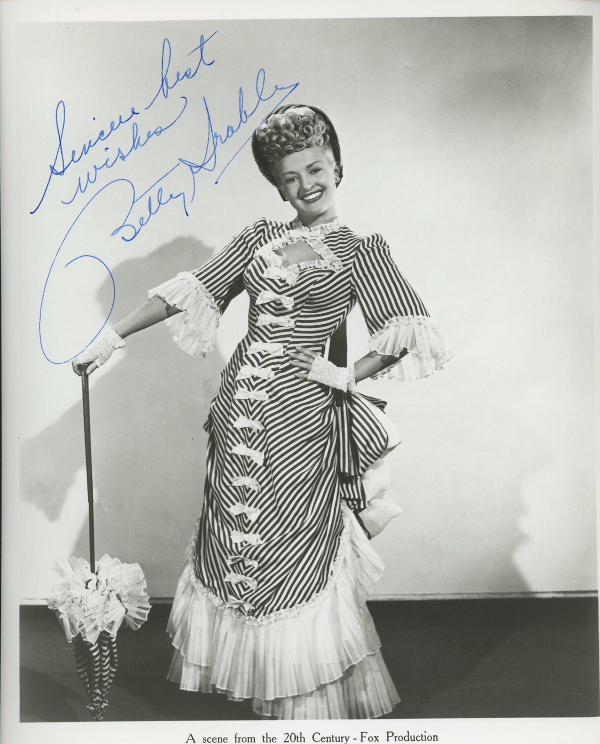 Betty Grable signed movie photo. GFA Authenticated