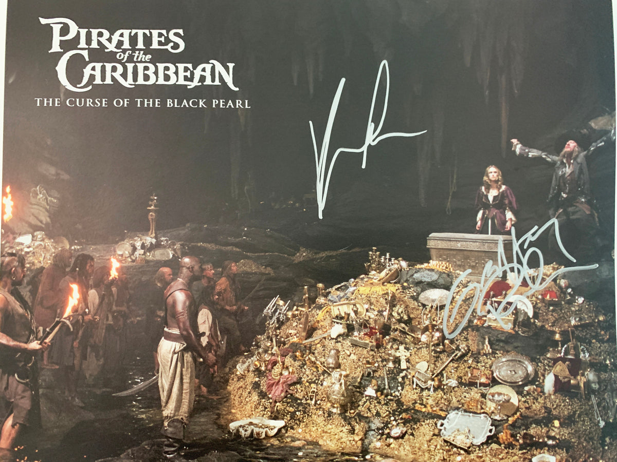 Pirates of the Caribbean: The Curse of the Black Pearl Geoffrey Rush and Keira Knightley signed lobby card. GFA Authenticated