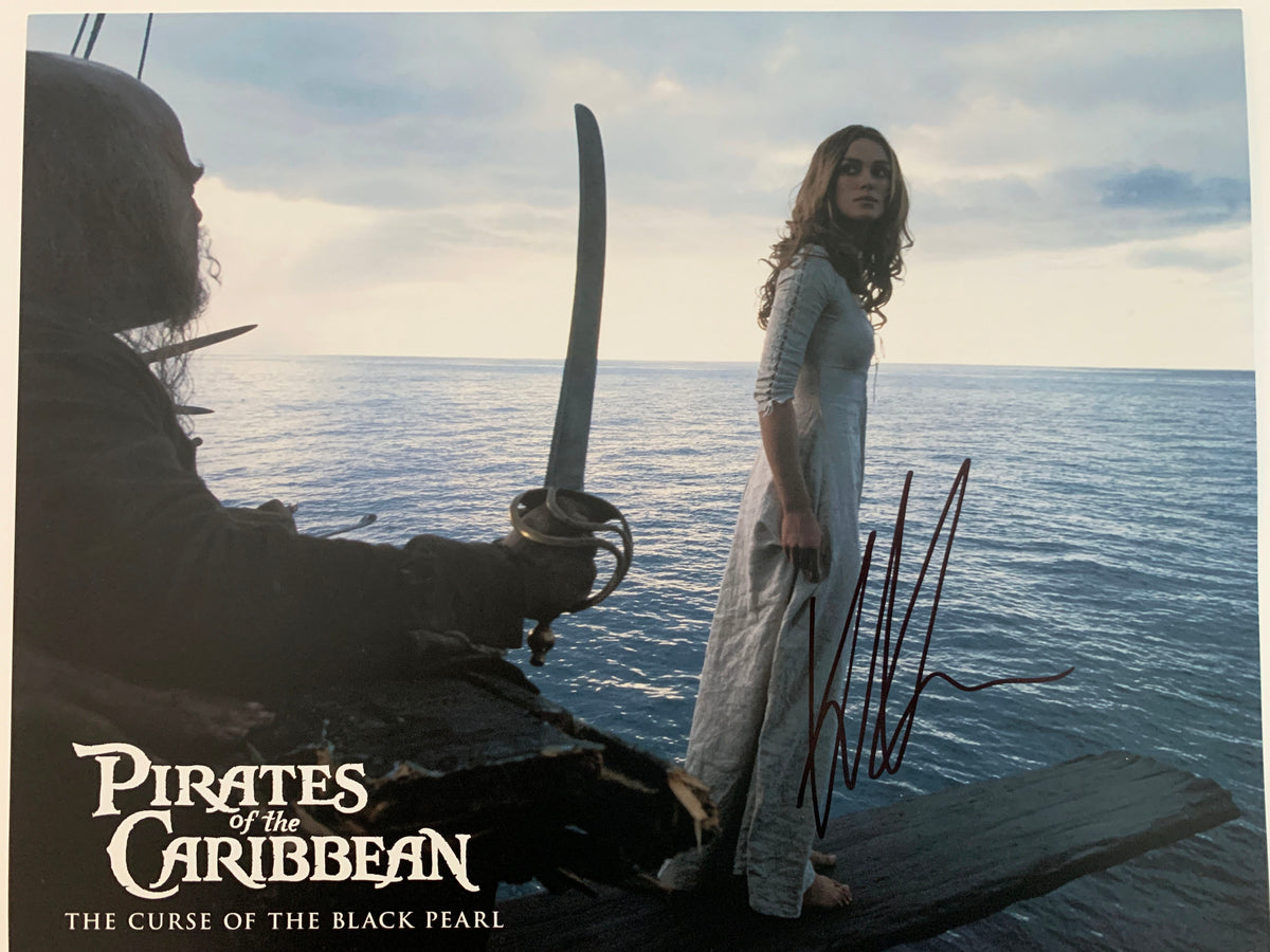 Pirates of the Caribbean: The Curse of the Black Pearl Keira Knightley signed lobby card. GFA Authenticated