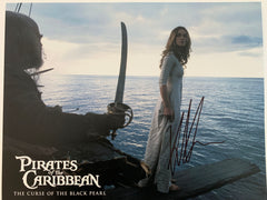 Pirates of the Caribbean: The Curse of the Black Pearl Keira Knightley signed lobby card. GFA Authenticated