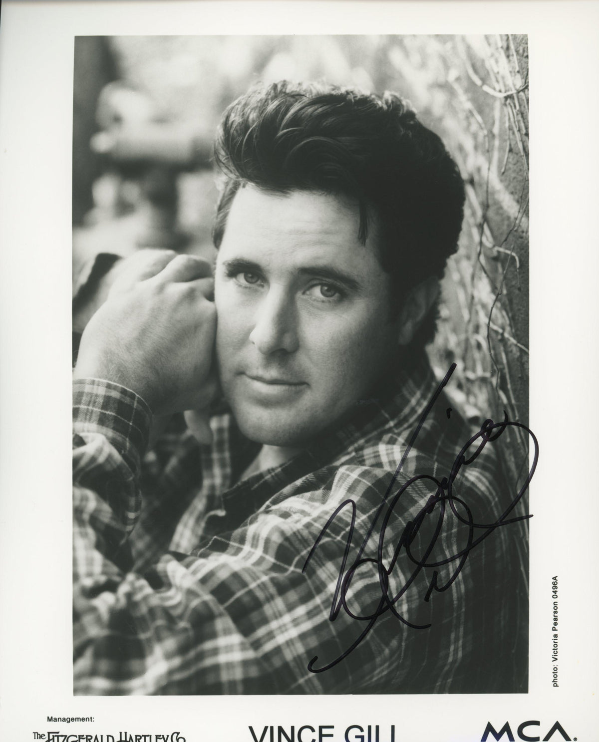 Vince Gill signed photo. GFA Authenticated