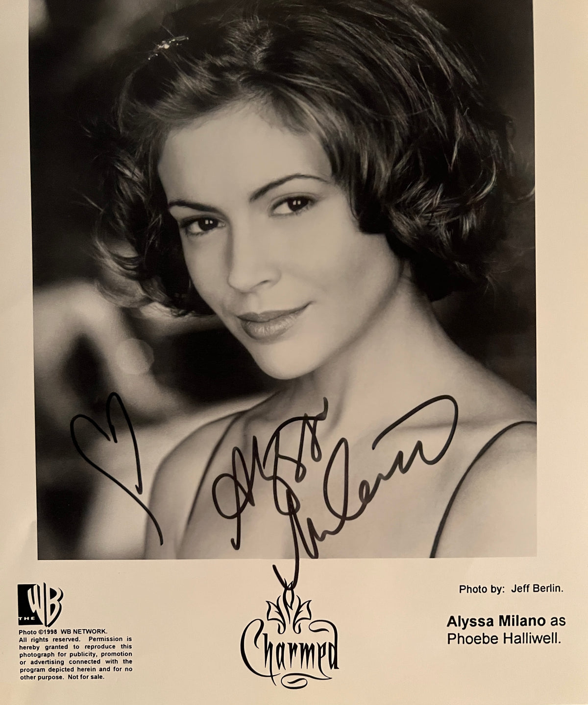 Alyssa Milano facsimile signed photo. 8x10 inches