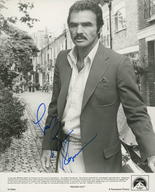 Rough Cut Burt Reynolds signed movie photo. GFA Authenticated