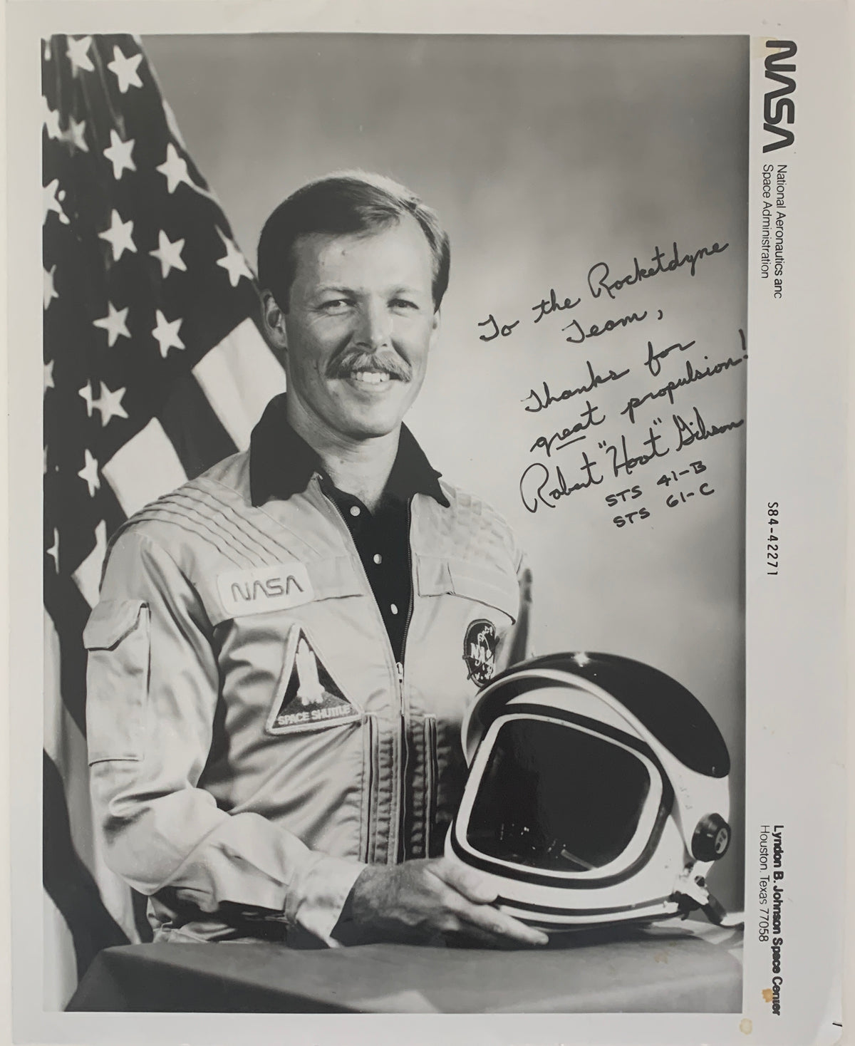 Astronaut Robert Gibson signed offical NASA photo. GFA Authenticated.