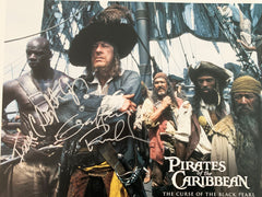 Pirates of the Caribbean: The Curse of the Black Pearl Geoffrey Rush and Isaac C. Singleton Jr. signed lobby card . GFA Authenticated