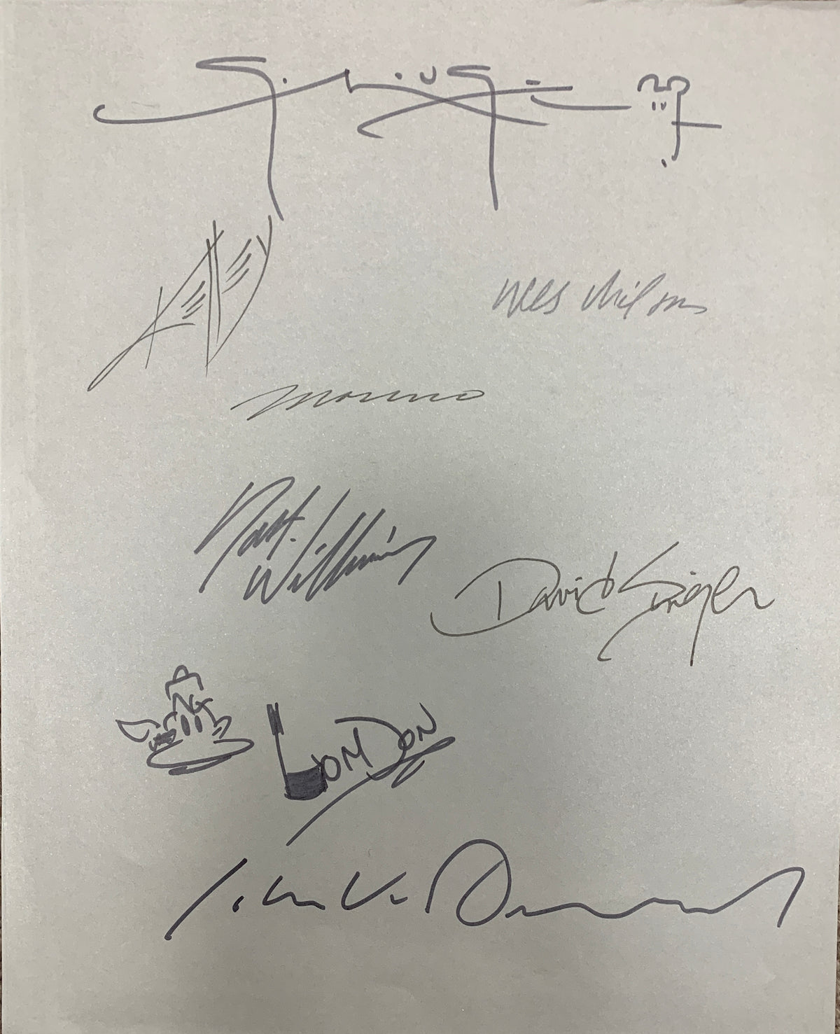 Various artists signed page