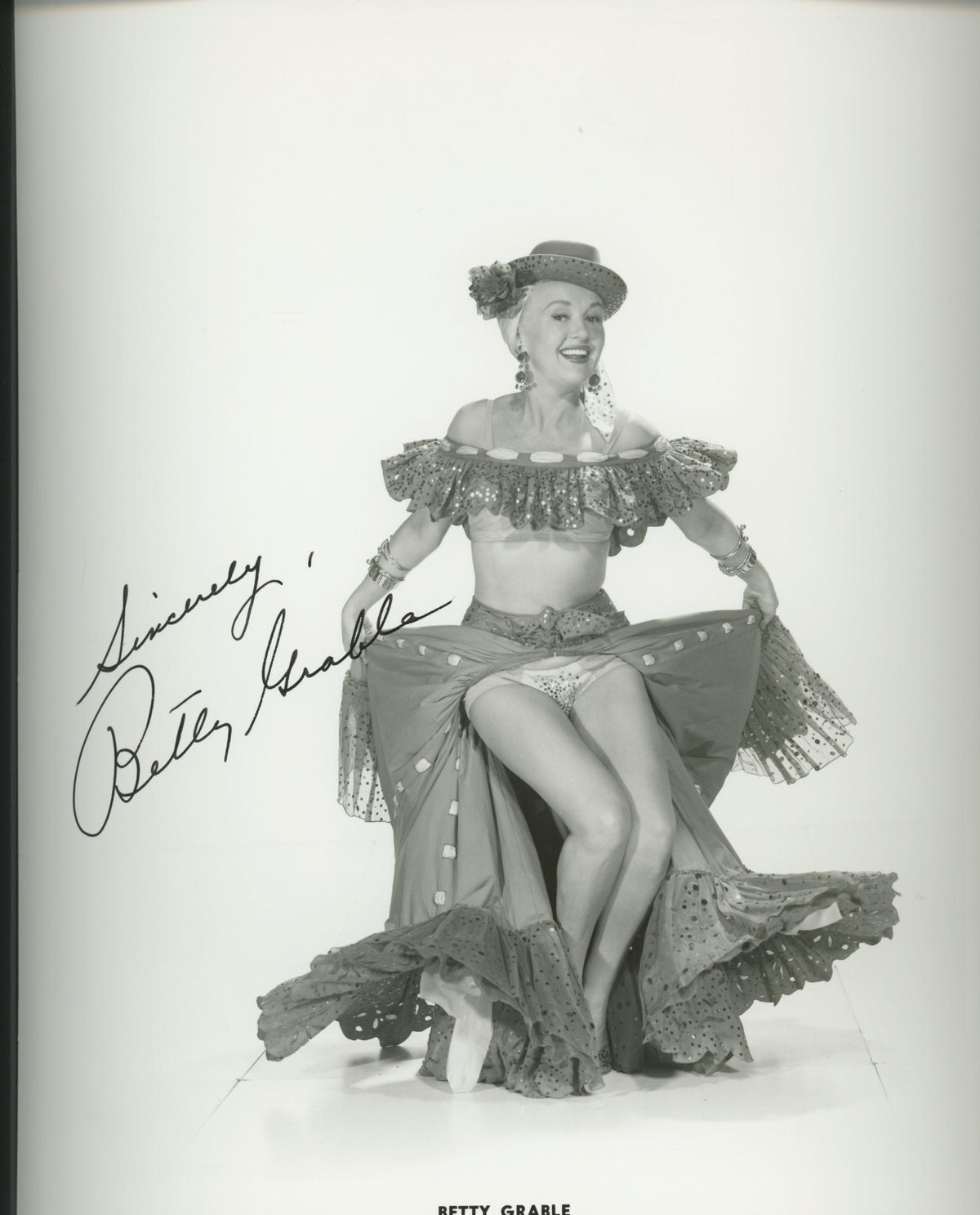 Betty Grable signed photo. GFA Authenticated